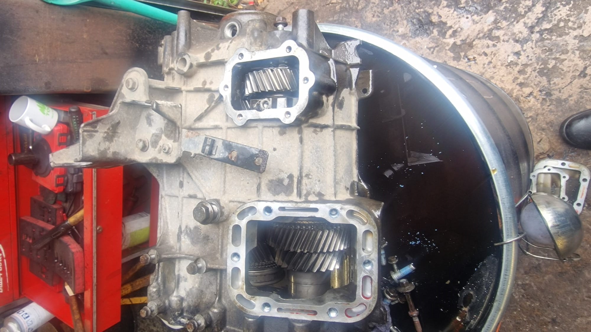 the bottom of a partially opened Iveco gearbox